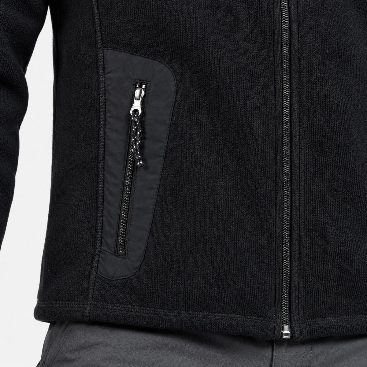 Detaliu buzunar cu fermoar și material fleece jachetă Crane Sports
