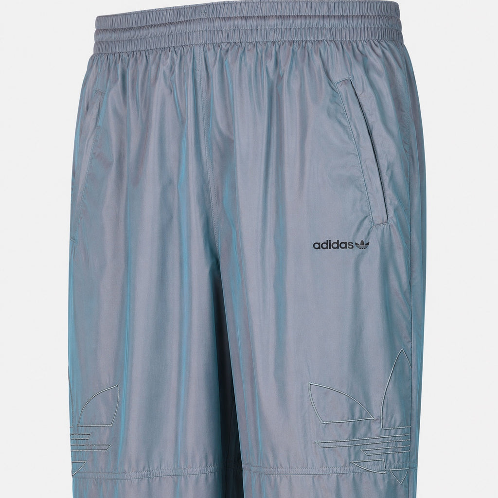 Pantaloni adidas Originals bleu irizați cu logo Trefoil