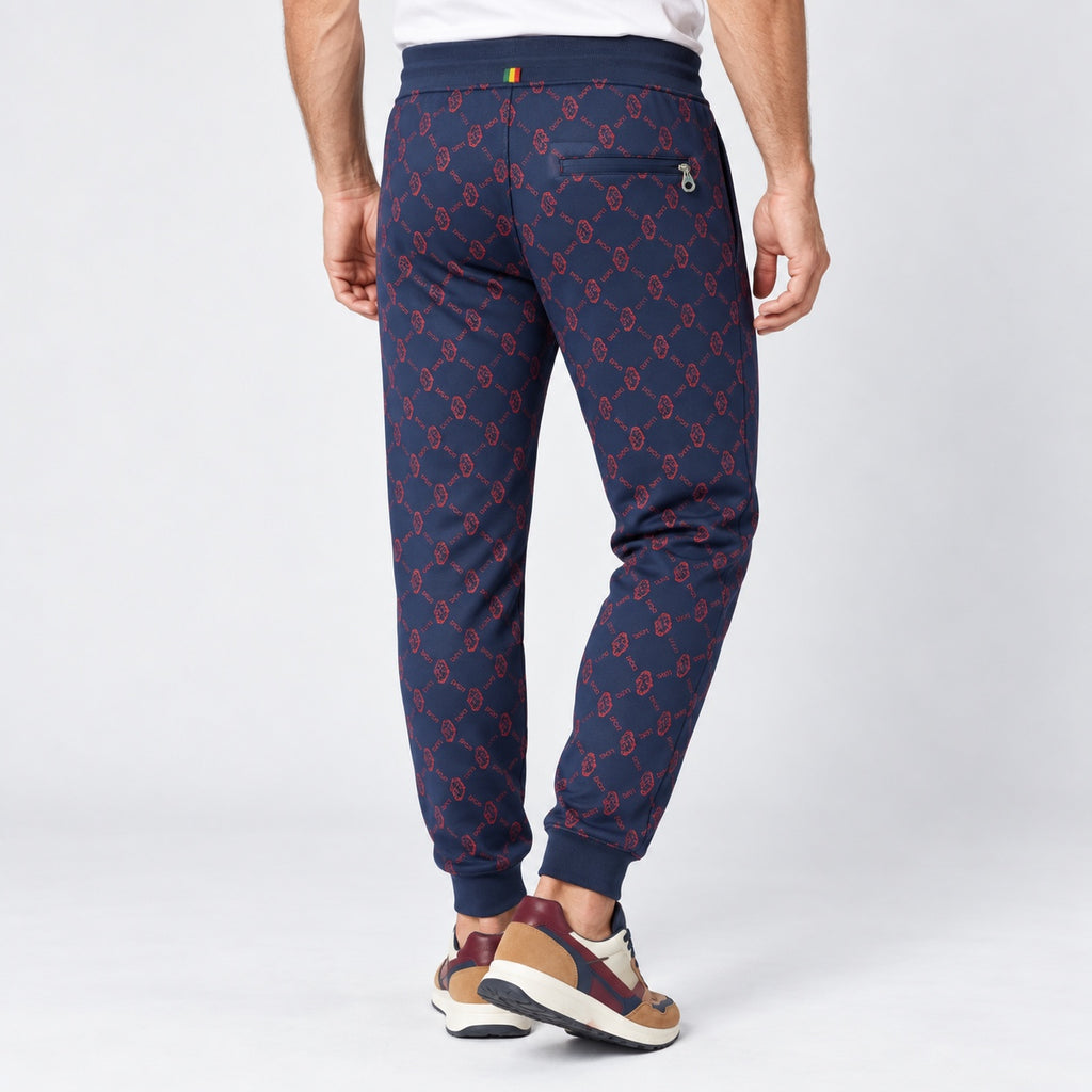 Pantaloni de trening Luke Sport bleumarin cu imprimeu roșu, vedere din spate pe model